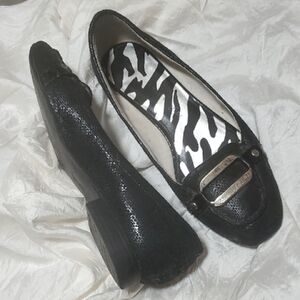 Anne Klein Black and Gold Flats with Elegant Cut-Out Design